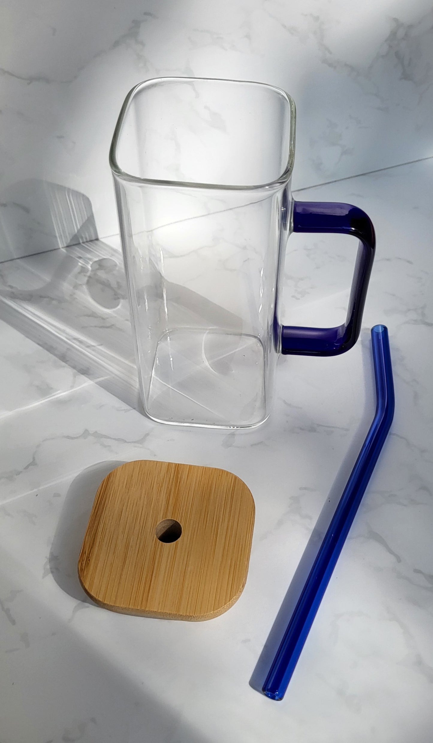 Glass tumbler with bamboo lid, glass straw and handle