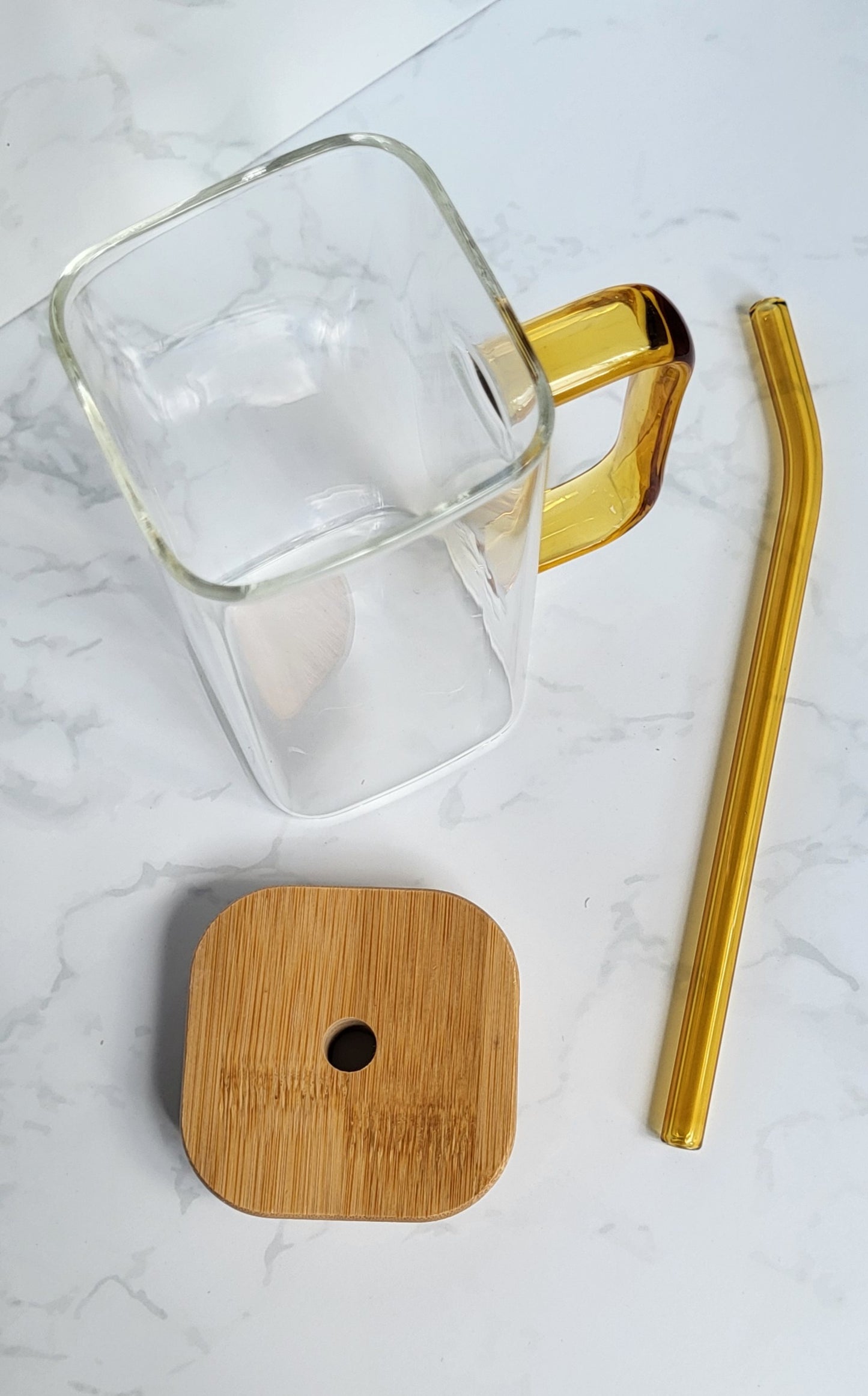 Glass tumbler with bamboo lid, glass straw and handle