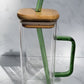 Glass tumbler with bamboo lid, glass straw and handle