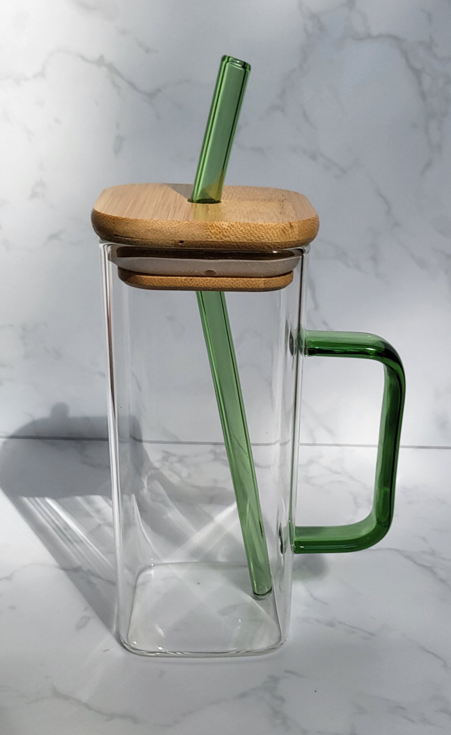 Glass tumbler with bamboo lid, glass straw and handle