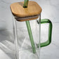 Glass tumbler with bamboo lid, glass straw and handle