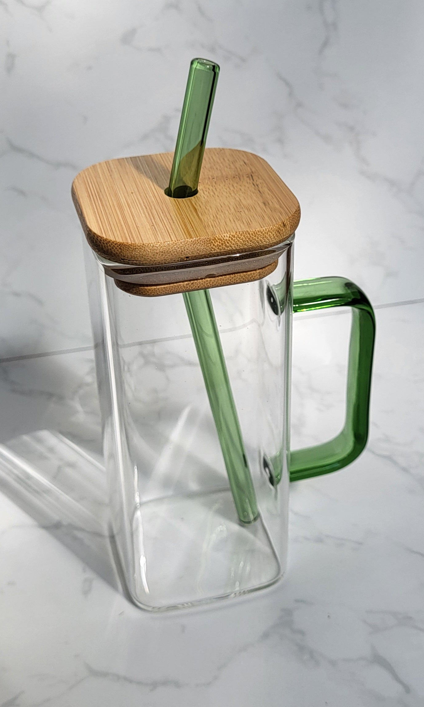 Glass tumbler with bamboo lid, glass straw and handle